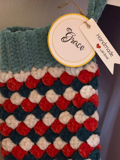 Handmade crochet item with a 'Name' tag and 'Handmade with Love' text on a neutral background.